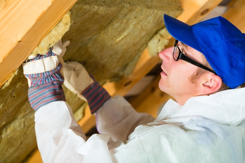 Man Installing Insulation