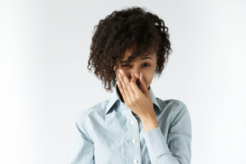 Woman Pinching Nose Bad Smell