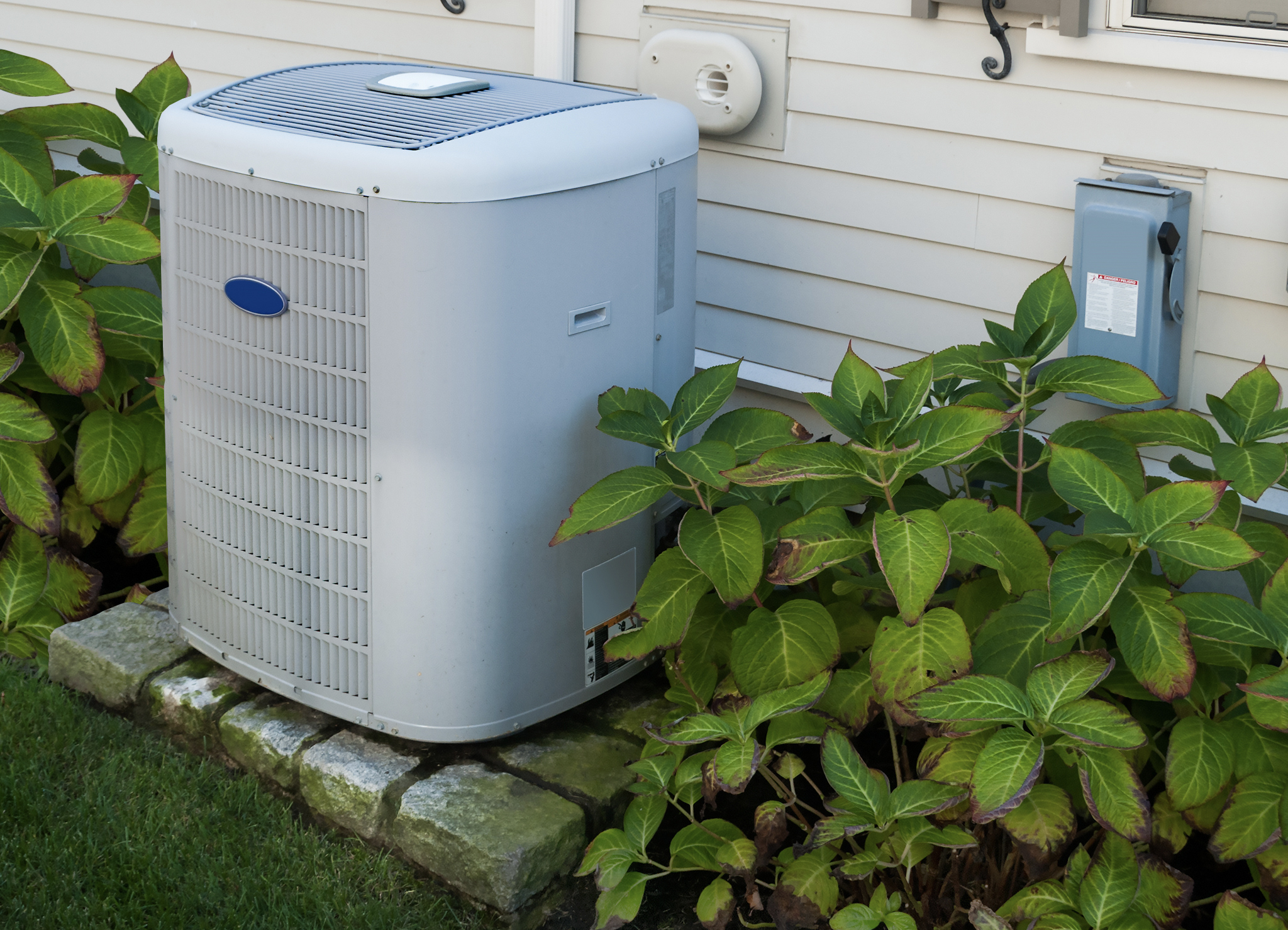 How can I landscape around my Air Conditioner?